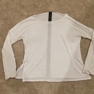 Soft and flowy white shirt with a zipper